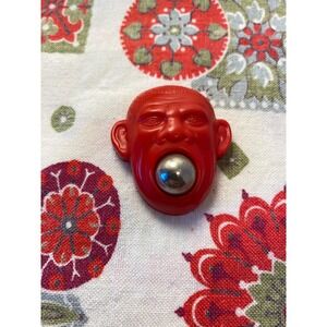 Vintage Red Plastic Monkey Head Novelty Toy with Removable Silver Ball Charm